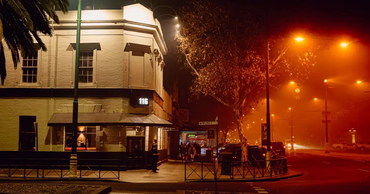 The Courthouse Hotel on the corner of Pall Mall and Mundy St at night